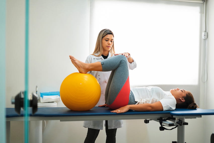 Woman with exercise ball