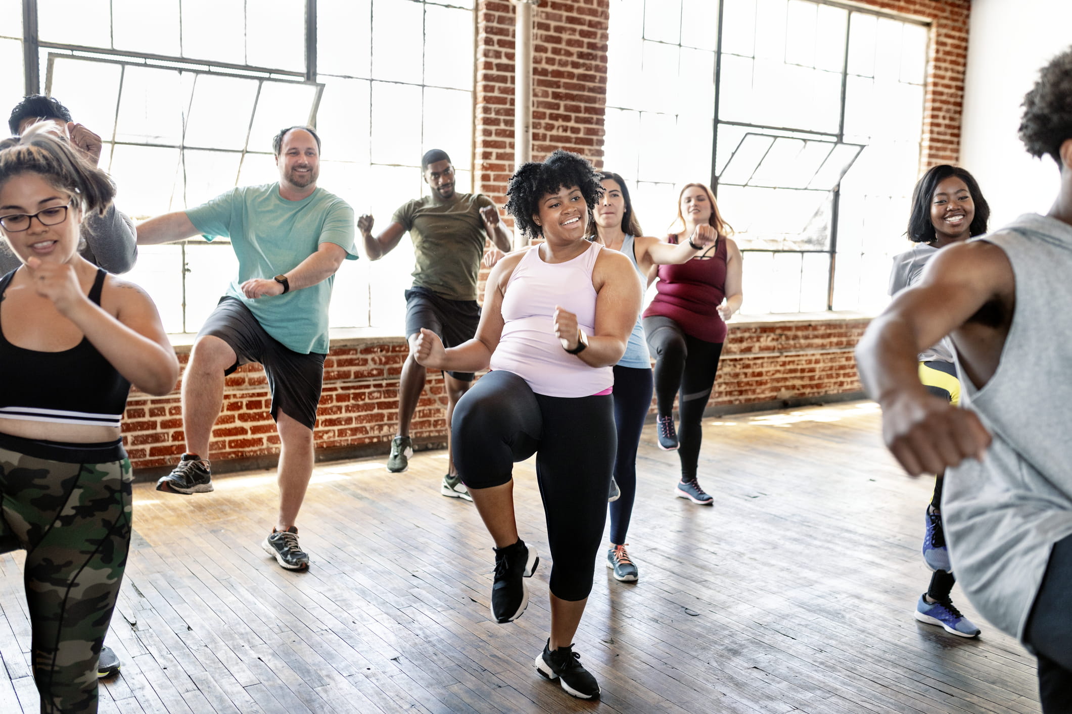 People in an active dance class