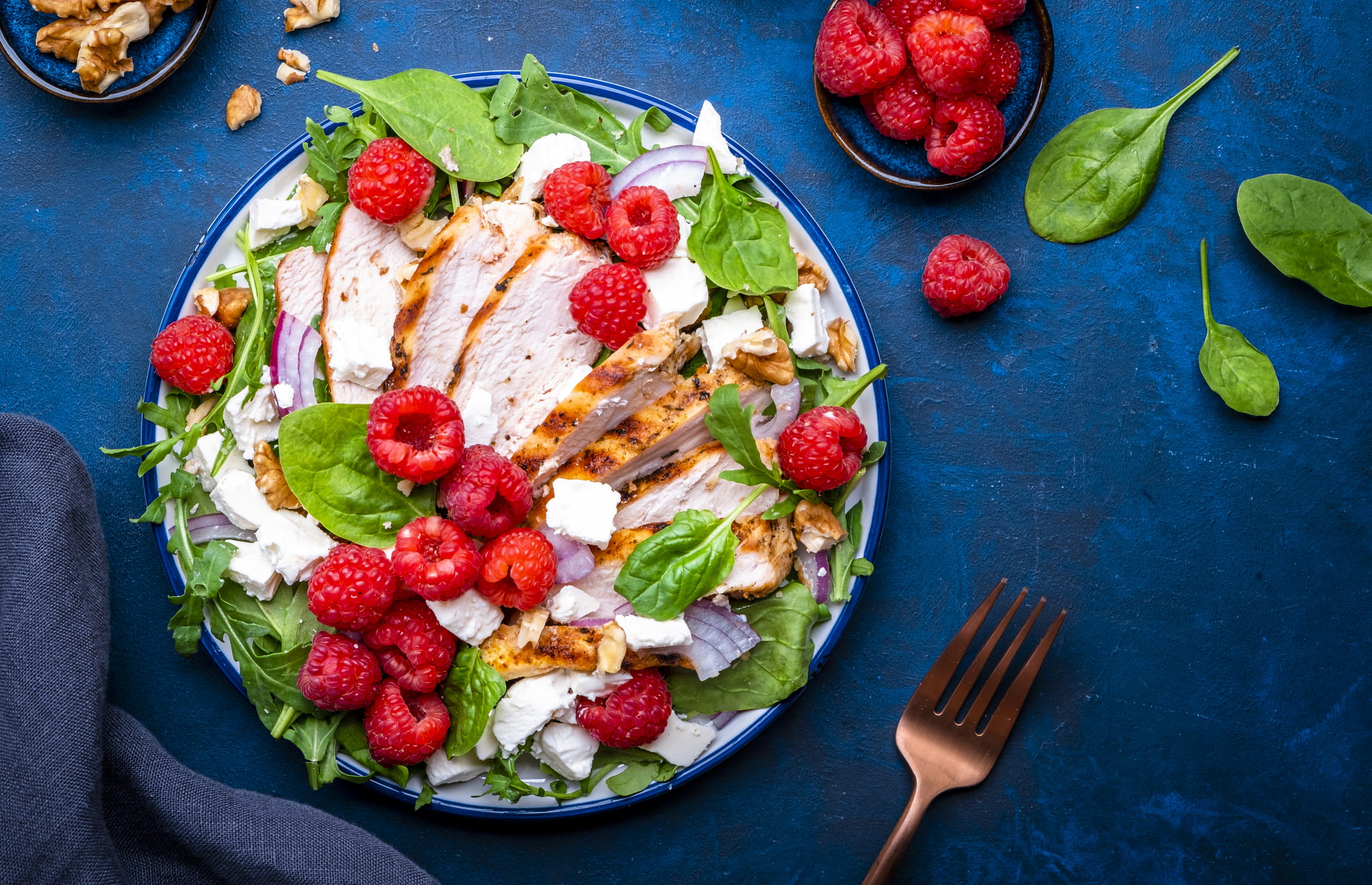 salad with fresh raspberries, grilled chicken, feta cheese