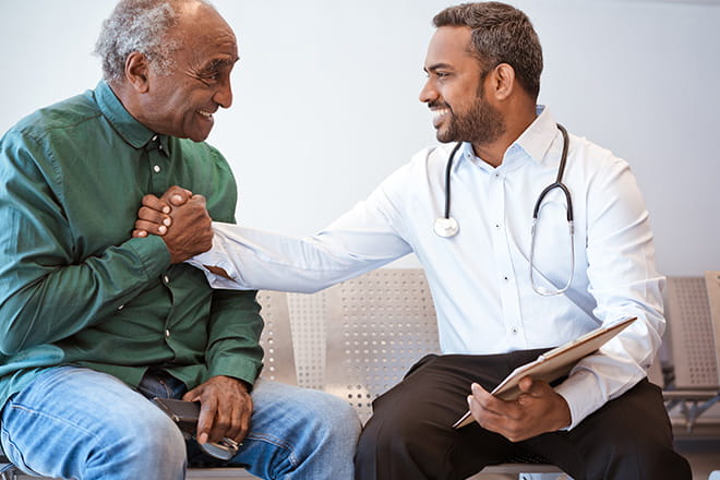 doctor and patient smiling