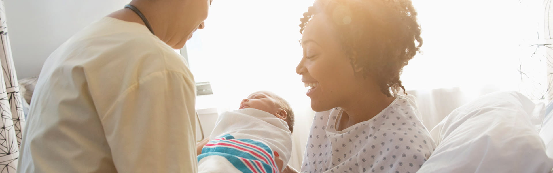 woman holding her brand new baby