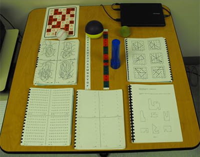 King-Devick scanning activities laid out on a table